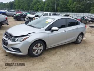 ✅ 2018 Chevrolet Cruze LS • VIN: 1G1BC5SM5J7214433 • Lot: 42616404. Listed on IAAI with 171,129 mi. Free auction sales archive from the USA and detailed vehicle history report at DreamBid. Image 2.