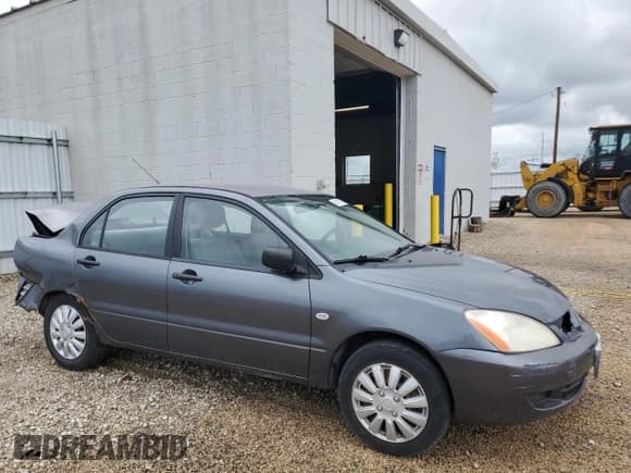 ✅ 2006 Mitsubishi Lancer ES • VIN: JA3AJ26E96U033787 • Лот: 61417165. Опубликован ранее на Copart с пробегом 184 282 миль. Бесплатный доступ к архиву аукционных продаж из США и подробный отчёт об истории автомобиля на DreamBid. Изображение 4.