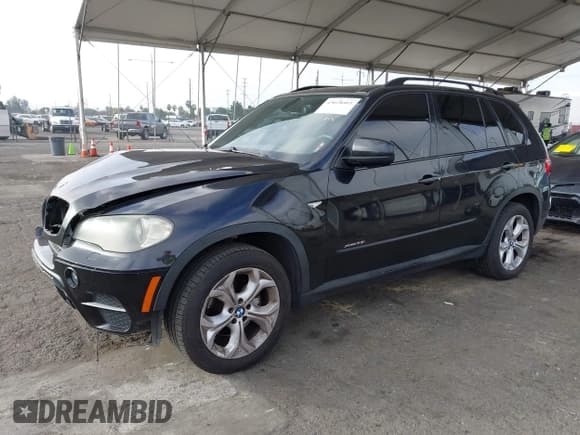 ✅ 2011 BMW X5 35i • VIN: 5UXZV4C51BL402438 • Lot: 43628461. Listed on IAAI with 150,710 mi. Free auction sales archive from the USA and detailed vehicle history report at DreamBid. Image 18.