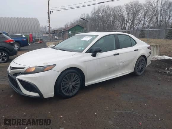 2021 Toyota Camry SE with VIN 4T1T11BK9MU033412, listed as a IAAI auction lot 41474773 with 52,330 mi miles and . Bid and sale history available at DreamBid. Image 2.