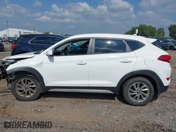 2018 Hyundai Tucson SEL z VIN KM8J3CA40JU702923, wystawiony jako IAAI lot #42997284 z przebiegiem 182 142 mil mil oraz . Historia ofert i sprzedaży dostępna na DreamBid. Obrazek 14.