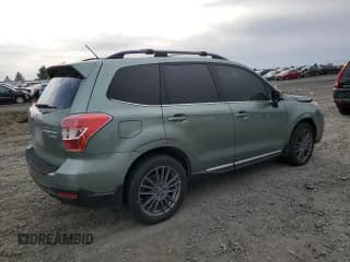 ✅ 2015 Subaru Forester Touring • VIN: JF2SJAWC4FH819974 • Лот: 89613475. Опубликован ранее на Copart с пробегом 143 413 миль. Бесплатный доступ к архиву аукционных продаж из США и подробный отчёт об истории автомобиля на DreamBid. Изображение 3.