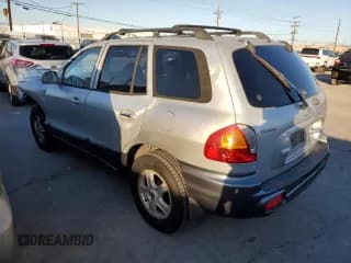 ✅ 2001 Hyundai Santa Fe GLS • VIN: KM8SC83D81U116159 • Лот: 87457485. Опубликован ранее на Copart с пробегом 130 440 миль. Бесплатный доступ к архиву аукционных продаж из США и подробный отчёт об истории автомобиля на DreamBid. Изображение 2.