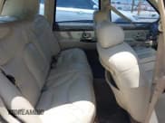 ✅ 1997 Lincoln Town Car Cartier • VIN: 1LNLM83W8VY627663 • Лот: 42392454. Опубликован ранее на IAAI с пробегом 209 440 миль. Бесплатный доступ к архиву аукционных продаж из США и подробный отчёт об истории автомобиля на DreamBid. Изображение 8.