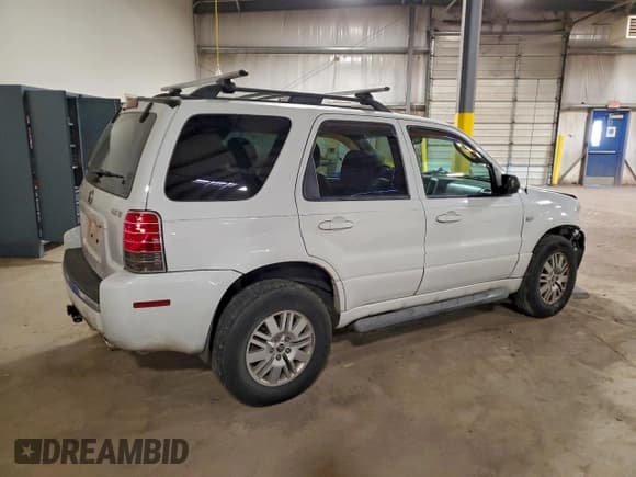 ✅ 2006 Mercury Mariner Luxury • VIN: 4M2CU57186DJ04311 • Lot: 96292005. Listed on Copart with 186,506 mi. Free auction sales archive from the USA and detailed vehicle history report at DreamBid. Image 3.