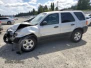 ✅ 2006 Ford Escape Hybrid • VIN: 1FMYU96H56KA48353 • Lot: 63620365. Listed on Copart with 165,223 mi. Free auction sales archive from the USA and detailed vehicle history report at DreamBid. Image 1.