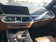 ✅ 2021 BMW X5 M • VIN: 5YMJU0C01M9E49090 • Lot: 43231982. Listed on IAAI with 30,337 mi. Free auction sales archive from the USA and detailed vehicle history report at DreamBid. Image 18.