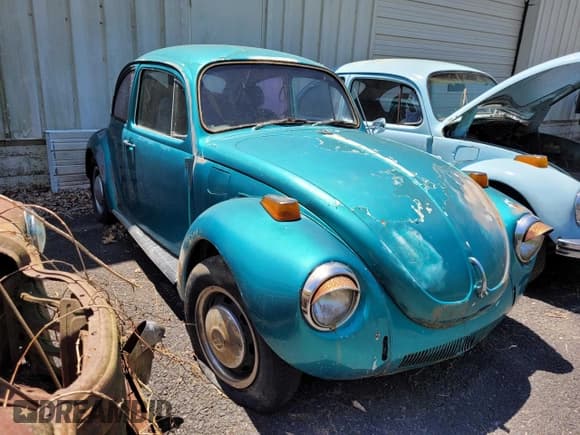✅ 1973 Volkswagen Beetle • VIN: 1332747151 • Lot: 45432915. Listed on Copart with 77,647 mi. Free auction sales archive from the USA and detailed vehicle history report at DreamBid. Image 1.