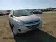 2011 Hyundai Tucson GLS z VIN KM8JU3ACXBU279726, wystawiony jako Copart lot #69819994 z przebiegiem 172 688 mil mil oraz Szkoda całkowita • Salvage title. Historia ofert i sprzedaży dostępna na DreamBid. Obrazek 12.