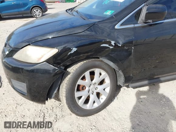 ✅ 2008 Mazda CX-7 Grand Touring • VIN: JM3ER29L880208165 • Лот: 43595808. Опубликован ранее на IAAI с пробегом 214 900 миль. Бесплатный доступ к архиву аукционных продаж из США и подробный отчёт об истории автомобиля на DreamBid. Изображение 6.