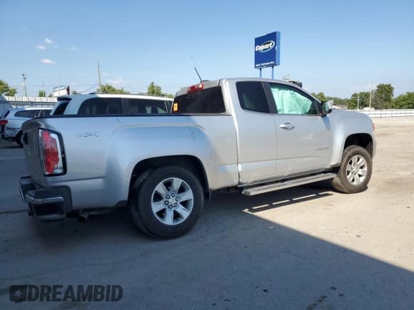 ✅ 2015 GMC Canyon 4WD SLE • VIN: 1GTH6BE3XF1147977 • Lot: 68933815. Listed on Copart with 76,935 mi. Free auction sales archive from the USA and detailed vehicle history report at DreamBid. Image 3.