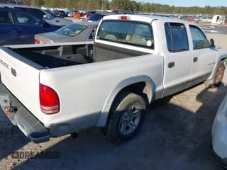 ✅ 2002 Dodge Dakota SLT • VIN: 1B7HL48N72S586317 • Lot: 41736566. Wystawiony na IAAI z przebiegiem Nie podano. Bezpłatny archiwum sprzedaży aukcyjnych z USA i szczegółowy raport historii pojazdu na DreamBid. Zdjęcie 4.