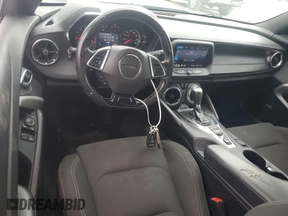 ✅ 2020 Chevrolet Camaro 1LT • VIN: 1G1FB3DX5L0137624 • Lot: 54423875. Listed on Copart with 66,079 mi. Free auction sales archive from the USA and detailed vehicle history report at DreamBid. Image 8.