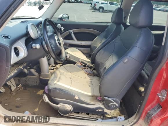 2003 MINI Hardtop with VIN WMWRC334X3TC47642, listed as a Copart auction lot 63665615 with Not provided miles and Salvage title. Bid and sale history available at DreamBid. Image 7.