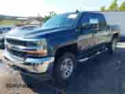 2018 Chevrolet Silverado 1500 LT z VIN 3GCUKREC4JG292008, wystawiony jako IAAI lot #43370209 z przebiegiem 96 545 mil mil oraz . Historia ofert i sprzedaży dostępna na DreamBid. Obrazek 2.