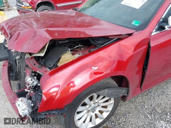 ✅ 2012 Chrysler 300 • VIN: 2C3CCAAG5CH261568 • Lot: 43719905. Listed on IAAI with 148,639 mi. Free auction sales archive from the USA and detailed vehicle history report at DreamBid. Image 17.