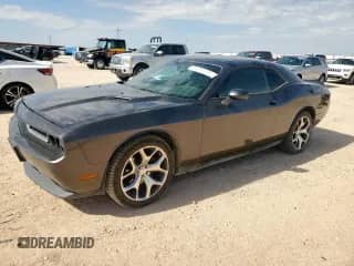 2014 Dodge Challenger Rallye Redline z VIN 2C3CDYAG4EH299155, wystawiony jako Copart lot #62533095 z przebiegiem 162 679 mil mil oraz Czysty tytuł • Clean title. Historia ofert i sprzedaży dostępna na DreamBid. Obrazek 1.