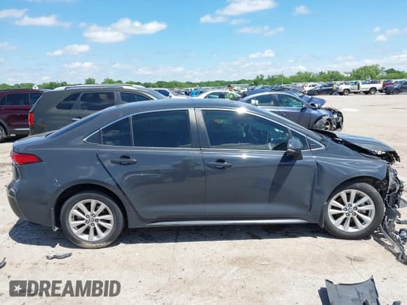 ✅ 2023 Toyota Corolla Hybrid LE • VIN: JTDBCMFE4P3003311 • Лот: 42202393. Опубликован ранее на IAAI с пробегом 27 961 миль. Бесплатный доступ к архиву аукционных продаж из США и подробный отчёт об истории автомобиля на DreamBid. Изображение 13.