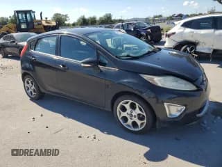 ✅ 2011 Ford Fiesta SES • VIN: 3FADP4FJ1BM148426 • Lot: 86828275. Listed on Copart with 142,206 mi. Free auction sales archive from the USA and detailed vehicle history report at DreamBid. Image 4.