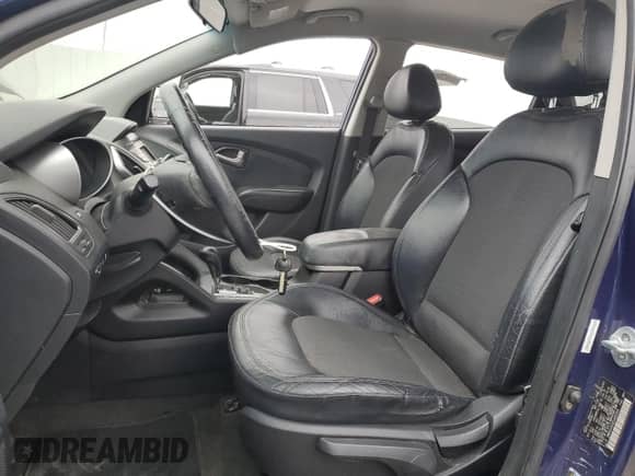 2012 Hyundai Tucson GLS z VIN KM8JUCAC6CU402049, wystawiony jako Copart lot #72261984 z przebiegiem 143 459 mil mil oraz Szkoda całkowita • Salvage title. Historia ofert i sprzedaży dostępna na DreamBid. Obrazek 7.