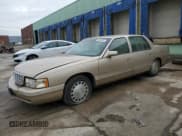 ✅ 1997 Cadillac DeVille • VIN: 1G6KD54Y5VU244028 • Lot: 86650584. Listed on Copart with 57,648 mi. Free auction sales archive from the USA and detailed vehicle history report at DreamBid. Image 1.