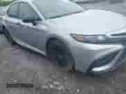 2021 Toyota Camry SE with VIN 4T1G11BK3MU026604, listed as a IAAI auction lot 42000560 with 104,453 mi miles and . Bid and sale history available at DreamBid. Image 6.