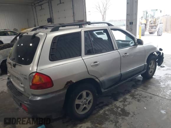 2004 Hyundai Santa Fe GLS with VIN KM8SC73E04U790250, listed as a IAAI auction lot 41301065 with 203,803 mi miles and . Bid and sale history available at DreamBid. Image 4.