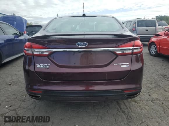 ✅ 2017 Ford Fusion Titanium • VIN: 3FA6P0D91HR175695 • Лот: 84728215. Опубликован ранее на Copart с пробегом 69 572 миль. Бесплатный доступ к архиву аукционных продаж из США и подробный отчёт об истории автомобиля на DreamBid. Изображение 6.