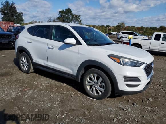 2019 Hyundai Tucson SE z VIN KM8J23A45KU869928, wystawiony jako Copart lot #87183485 z przebiegiem 42 648 mil mil oraz Szkoda całkowita • Salvage title. Historia ofert i sprzedaży dostępna na DreamBid. Obrazek 4.