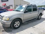 ✅ 2003 Ford Explorer Sport Trac XLS • VIN: 1FMZU77E23UA64779 • Lot: 42241409. Wystawiony na IAAI z przebiegiem 212 608 mil. Bezpłatny archiwum sprzedaży aukcyjnych z USA i szczegółowy raport historii pojazdu na DreamBid. Zdjęcie 2.