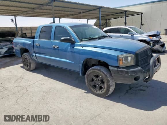 2005 Dodge Dakota SLT с VIN 1D7HE48N25S218826, выставлен на аукционе Copart как лот 61421965 с пробегом 189 195 миль миль и Чистый • Clean title. История ставок и продаж доступна на DreamBid. Изображение 4.