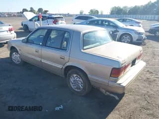 ✅ 1992 Dodge Spirit • VIN: 3B3XA4638NT238159 • Lot: 43300458. Listed on IAAI with 158,922 mi. Free auction sales archive from the USA and detailed vehicle history report at DreamBid. Image 3.