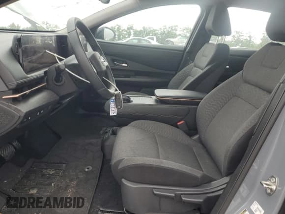 ✅ 2023 Nissan ARIYA Venture+ • VIN: JN1BF0AA3PM401840 • Lot: 56451365. Listed on Copart with 12,827 mi. Free auction sales archive from the USA and detailed vehicle history report at DreamBid. Image 7.