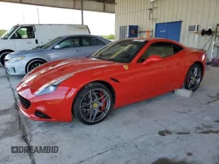 ✅ 2016 Ferrari California T • VIN: ZFF77XJA4G0215371 • Lot: 61899015. Wystawiony na Copart z przebiegiem 15 435 mil. Bezpłatny archiwum sprzedaży aukcyjnych z USA i szczegółowy raport historii pojazdu na DreamBid. Zdjęcie 1.