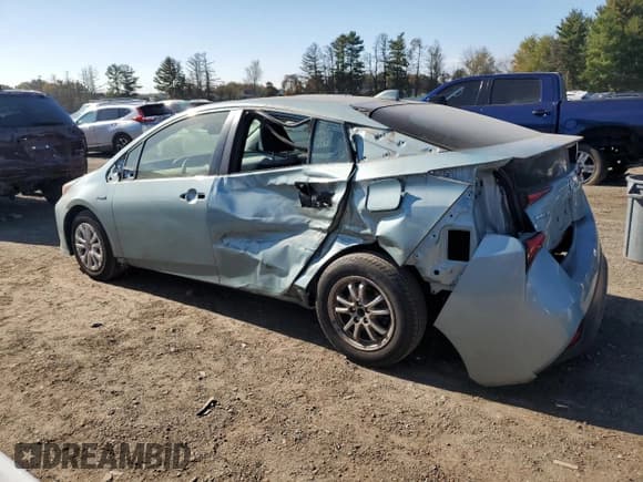 ✅ 2020 Toyota Prius LE • VIN: JTDKARFU9L3114988 • Lot: 87010785. Listed on Copart with 96,022 mi. Free auction sales archive from the USA and detailed vehicle history report at DreamBid. Image 2.
