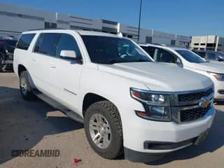 ✅ 2018 Chevrolet Suburban LS • VIN: 1GNSKGKC1JR137052 • Lot: 42942872. Listed on IAAI with 150,898 mi. Free auction sales archive from the USA and detailed vehicle history report at DreamBid. Image 1.