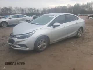 ✅ 2018 Chevrolet Cruze LT • VIN: 1G1BE5SM0J7105775 • Lot: 37842543. Listed on Copart with 132,935 mi. Free auction sales archive from the USA and detailed vehicle history report at DreamBid. Image 1.