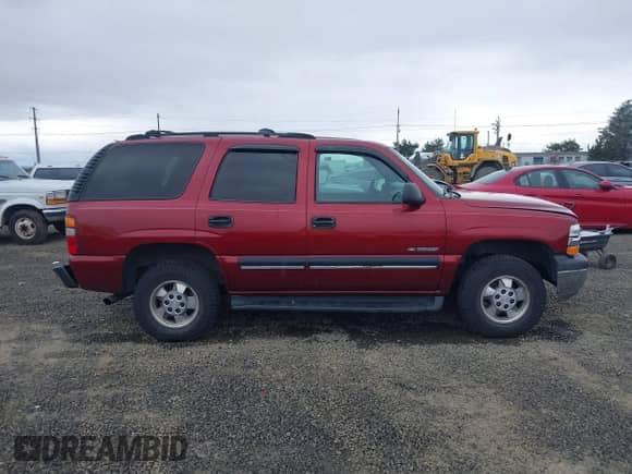2001 Chevrolet Tahoe LT with VIN 1GNEK13T51R217446, listed as a IAAI auction lot 41970321 with 196,766 mi miles and . Bid and sale history available at DreamBid. Image 13.