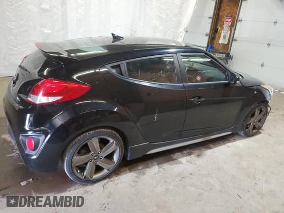 2015 Hyundai Veloster Turbo z VIN KMHTC6AE5FU226436, wystawiony jako Copart lot #49742034 z przebiegiem 99 852 mil mil oraz . Historia ofert i sprzedaży dostępna na DreamBid. Obrazek 3.