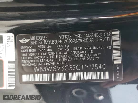 2012 MINI Hardtop S with VIN WMWSV3C52CTY17540, listed as a Copart auction lot 64137185 with 115,542 mi miles and Salvage title. Bid and sale history available at DreamBid. Image 12.