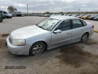 ✅ 2004 Saturn L • VIN: 1G8JL54RX4Y510049 • Lot: 62339275. Listed on Copart with 86,057 mi. Free auction sales archive from the USA and detailed vehicle history report at DreamBid. Image 1.