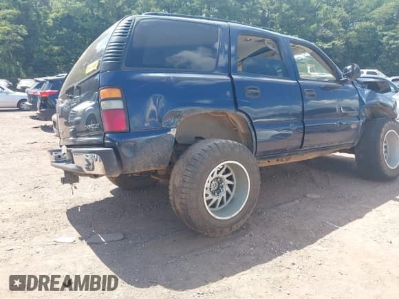✅ 2004 Chevrolet Tahoe LT • VIN: 1GNEC13Z94J281980 • Lot: 42812157. Listed on IAAI with Not provided. Free auction sales archive from the USA and detailed vehicle history report at DreamBid. Image 4.
