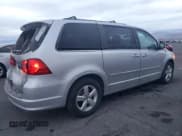 ✅ 2011 Volkswagen Routan SE • VIN: 2V4RW3DG8BR669890 • Lot: 93101745. Listed on Copart with 141,323 mi. Free auction sales archive from the USA and detailed vehicle history report at DreamBid. Image 3.