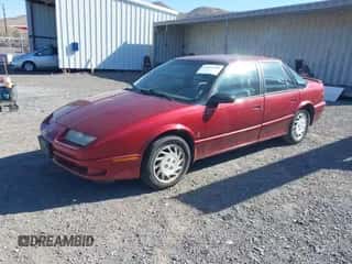 1994 Saturn SL z VIN 1G8ZJ5579RZ319147, wystawiony jako IAAI lot #43231928 z przebiegiem 218 975 mil mil oraz . Historia ofert i sprzedaży dostępna na DreamBid. Obrazek 2.