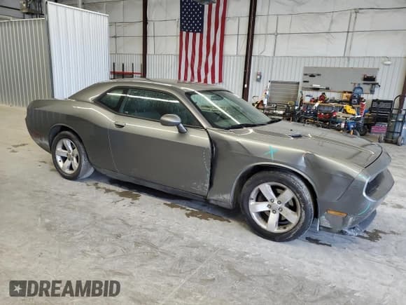 ✅ 2012 Dodge Challenger SXT • VIN: 2C3CDYAG1CH174885 • Lot: 44727385. Wystawiony na Copart z przebiegiem 219 845 mil. Bezpłatny archiwum sprzedaży aukcyjnych z USA i szczegółowy raport historii pojazdu na DreamBid. Zdjęcie 4.