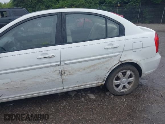 ✅ 2006 Hyundai Accent GLS • VIN: KMHCN46C56U056777 • Лот: 42344945. Опубликован ранее на IAAI с пробегом 95 349 миль. Бесплатный доступ к архиву аукционных продаж из США и подробный отчёт об истории автомобиля на DreamBid. Изображение 6.