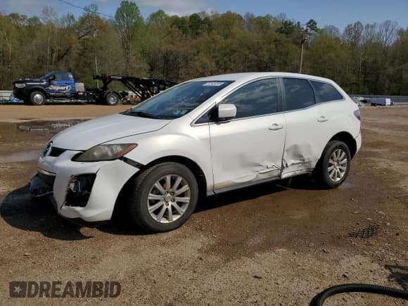 ✅ 2011 Mazda CX-7 i SV • VIN: JM3ER2A57B0382295 • Lot: 51141015. Listed on Copart with 166,680 mi. Free auction sales archive from the USA and detailed vehicle history report at DreamBid. Image 1.