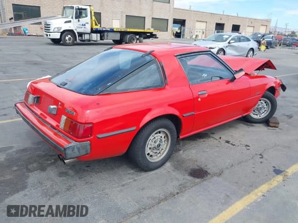 ✅ 1979 Mazda RX-7 • VIN: 000000SA22C502501 • Lot: 42804723. Listed on IAAI with 27,495 mi. Free auction sales archive from the USA and detailed vehicle history report at DreamBid. Image 4.