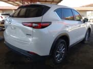 ✅ 2022 Mazda CX-5 S Carbon Edition • VIN: JM3KFBCM0N1607834 • Лот: 43594977. Опубликован ранее на IAAI с пробегом 38 794 миль. Бесплатный доступ к архиву аукционных продаж из США и подробный отчёт об истории автомобиля на DreamBid. Изображение 4.