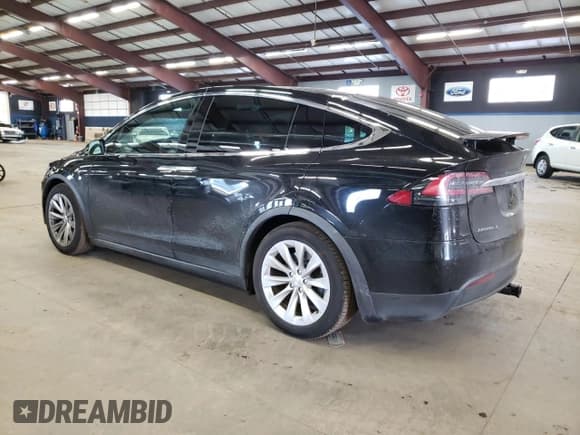 ✅ 2018 Tesla Model X 75D • VIN: 5YJXCDE2XJF129826 • Lot: 42047573. Listed on Copart with 46,756 mi. Free auction sales archive from the USA and detailed vehicle history report at DreamBid. Image 2.